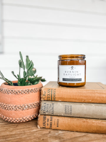 Our best-selling scent!  Tropical fruits paired with sugared citrus.  14 oz, double-wick, soy candle, in a 16 oz amber jar. Hand poured on the farm! 